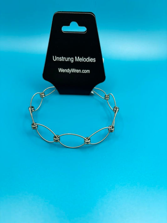 Guitar string woven bracelet