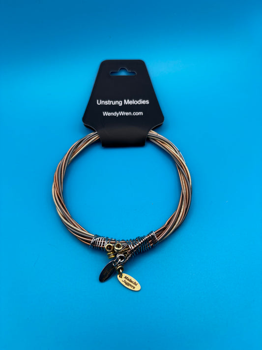 Wrapped guitar string bracelet