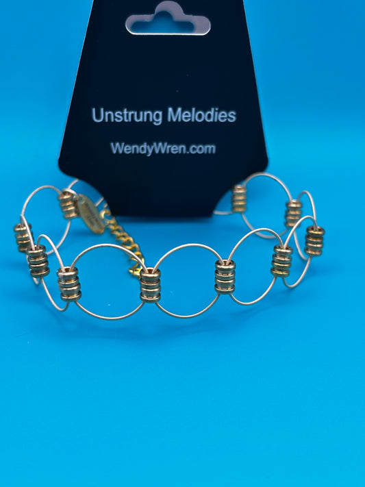 Single weave guitar string bracelet