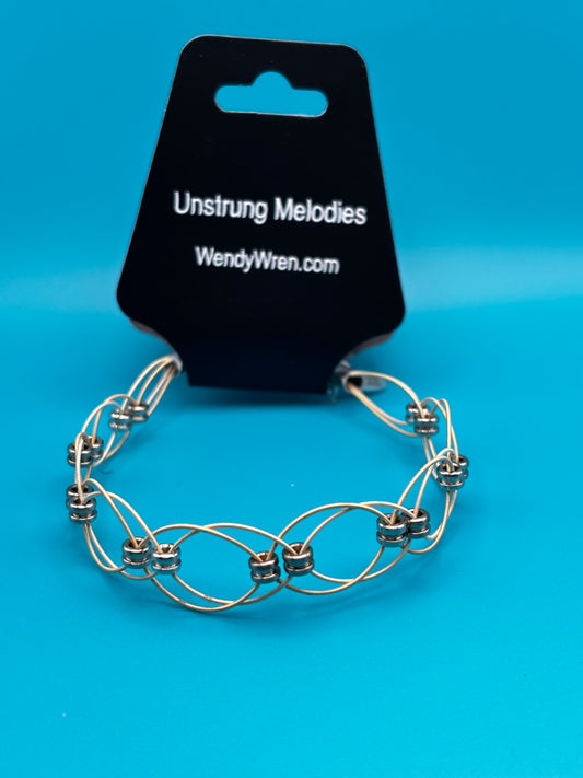 Double weave guitar string bracelet