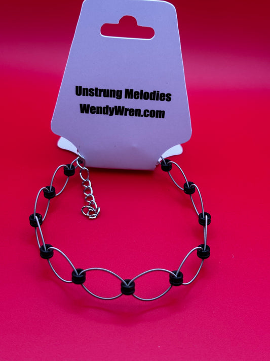 Guitar string woven bracelet