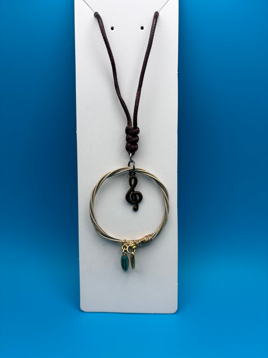 Guitar string pendant necklace