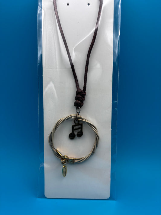 Guitar string pendant necklace