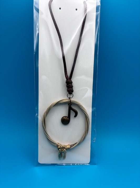 Guitar string pendant necklace
