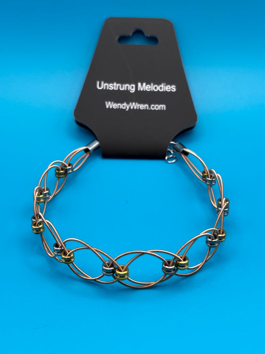 Double weave guitar string bracelet