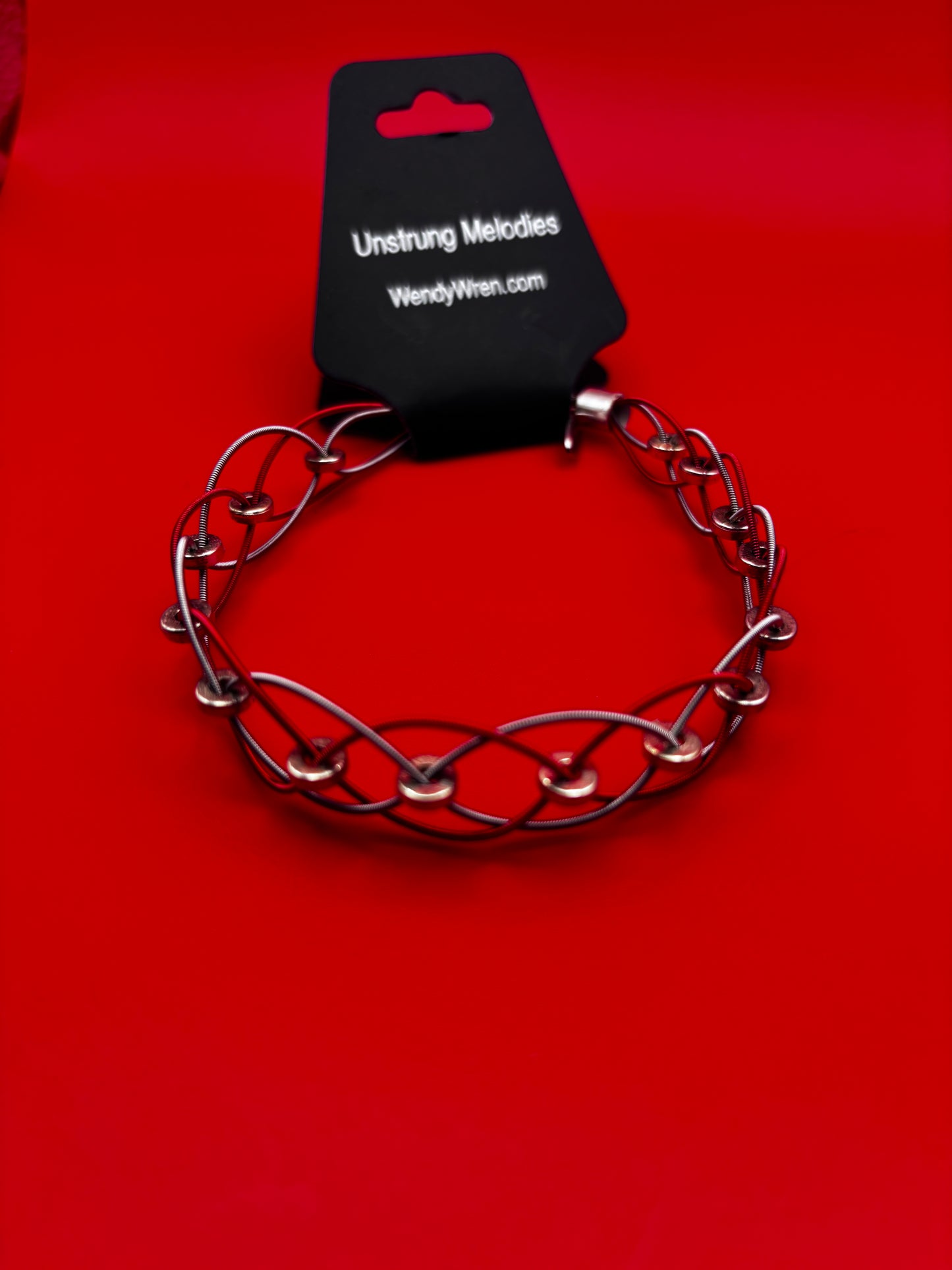 Woven guitar string bracelet