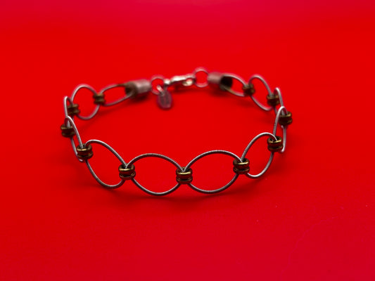 Guitar string woven bracelet