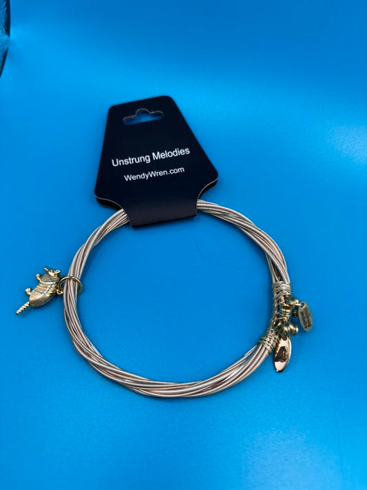 Guitar string bangle bracelet