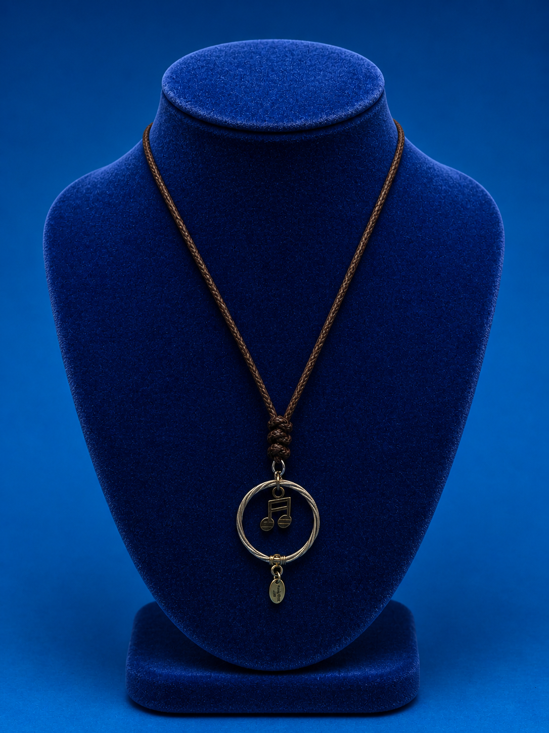 Guitar string pendant necklace